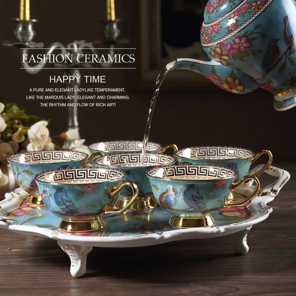 Bone China Tassen- und Untertassen-Set mit blauem Blumen- und Vogelmotiv Bone China Tassen- und Untertassen-Set mit blauem Blumen- und Vogelmotiv