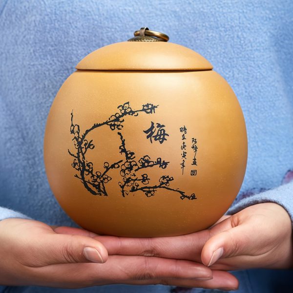 Runde Teedose aus Yixing-Ton mit Motiv der „Vier Edlen“