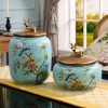 Grüne Keramik-Teedose mit Blumen- und Vogelmotiven & goldenem Hirschdeckel Green Floral Bird Ceramic Tea Caddy with Golden Deer Lid | Airtight Loose Tea Tin - 1