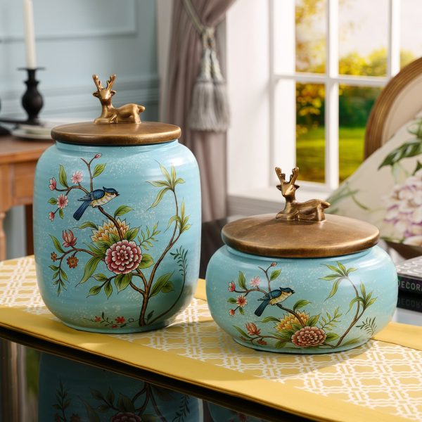 Grüne Keramik-Teedose mit Blumen- und Vogelmotiven & goldenem Hirschdeckel Grüne Keramik-Teedose mit Blumen- und Vogelmotiven & goldenem Hirschdeckel