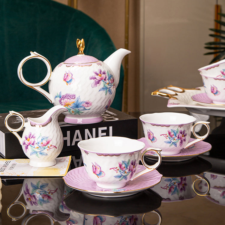 Chinese porcelain tea set with gold rims